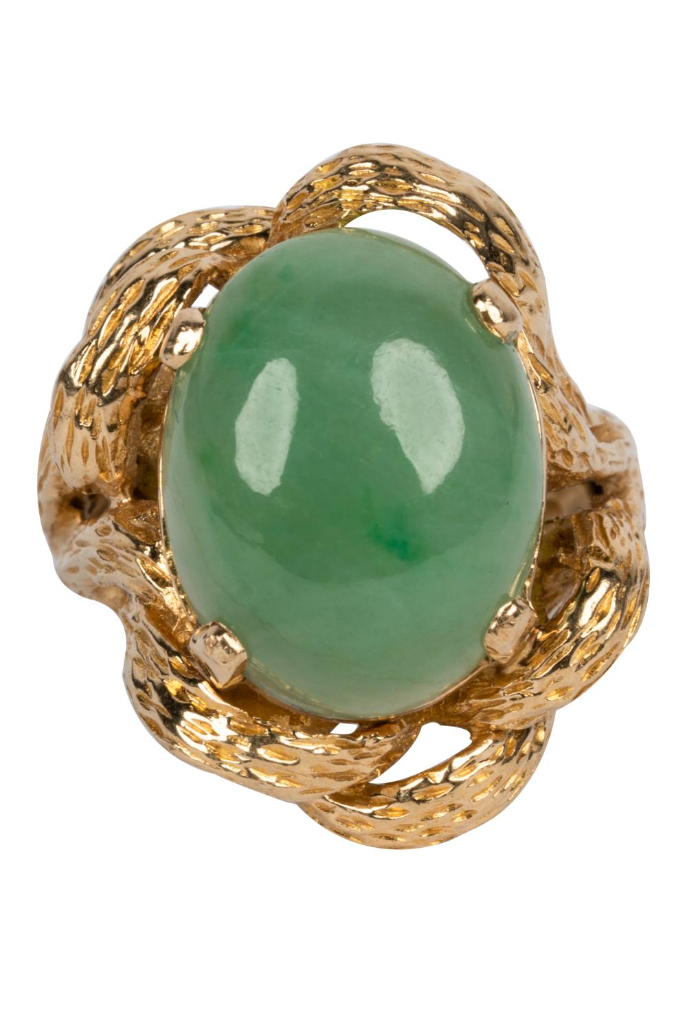 Appraisal: KARAT YELLOW GOLD JADE RINGcentering one oval cabochon jadeite jade