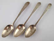 Appraisal: Irish silver A set of three Celtic point brightcut dessertspoons