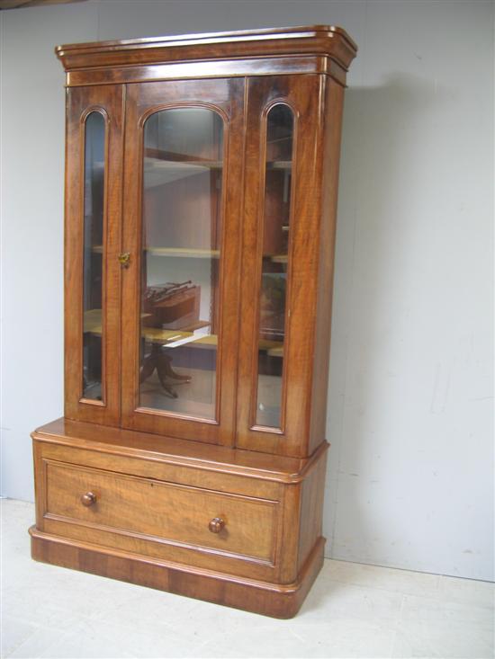 Appraisal: th Century mahogany bookcase with rounded corners single glazed door