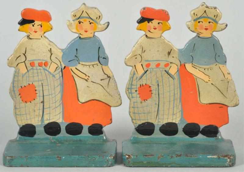 Appraisal: Pair of Cast Iron Dutch Boy Girl Bookends The boy