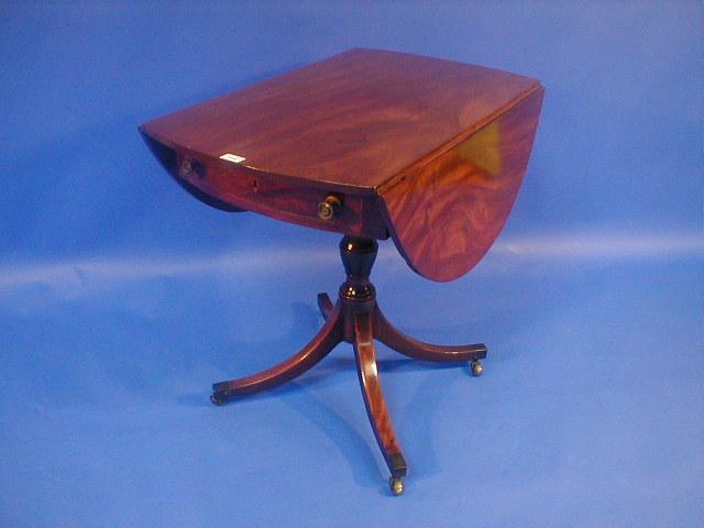 Appraisal: A thC mahogany Pembroke table with oval top with bow