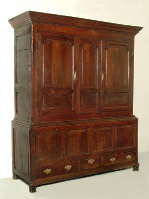 Appraisal: AN OAK PANELLED PRESS CUPBOARD with moulded cornice two ogee