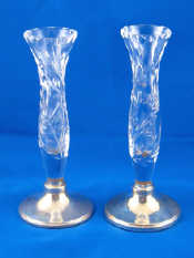 Appraisal: A pair of sterling silver mounted cut glass specimen vases