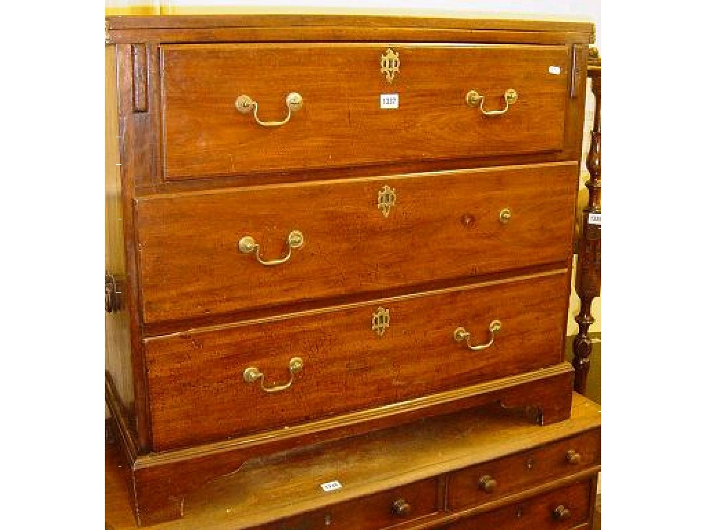 Appraisal: A Georgian mahogany chest fitted with three long drawers beneath