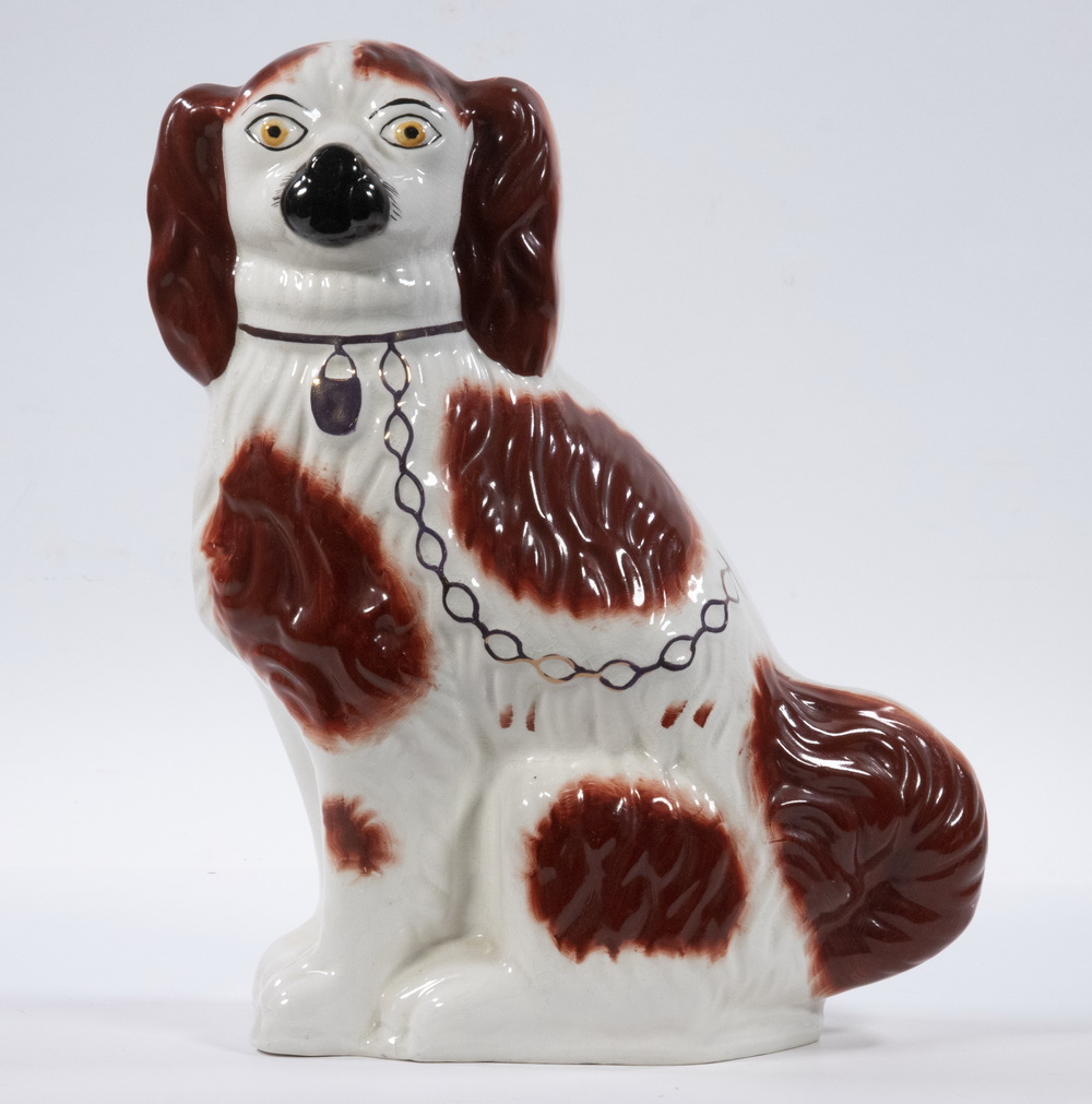 Appraisal: STAFFORDSHIRE SEATED SPANIEL Early th c English Pottery King Charles