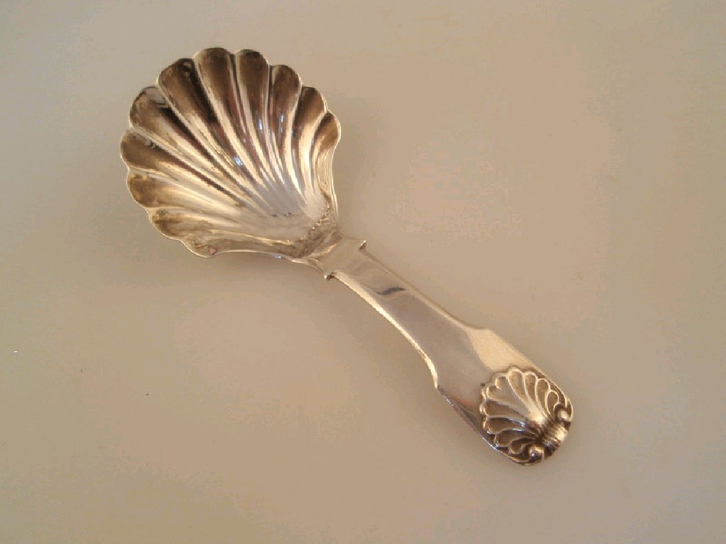 Appraisal: A George III silver caddy spoon with a shell bowl