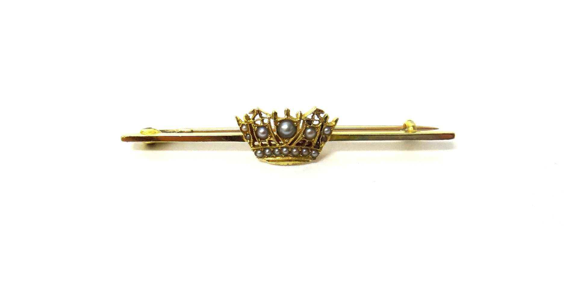 Appraisal: A gold and seed pearl set bar brooch with a