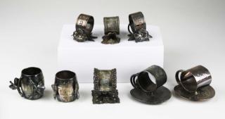 Appraisal: lot of silver plated napkin rings incl floral lily pad