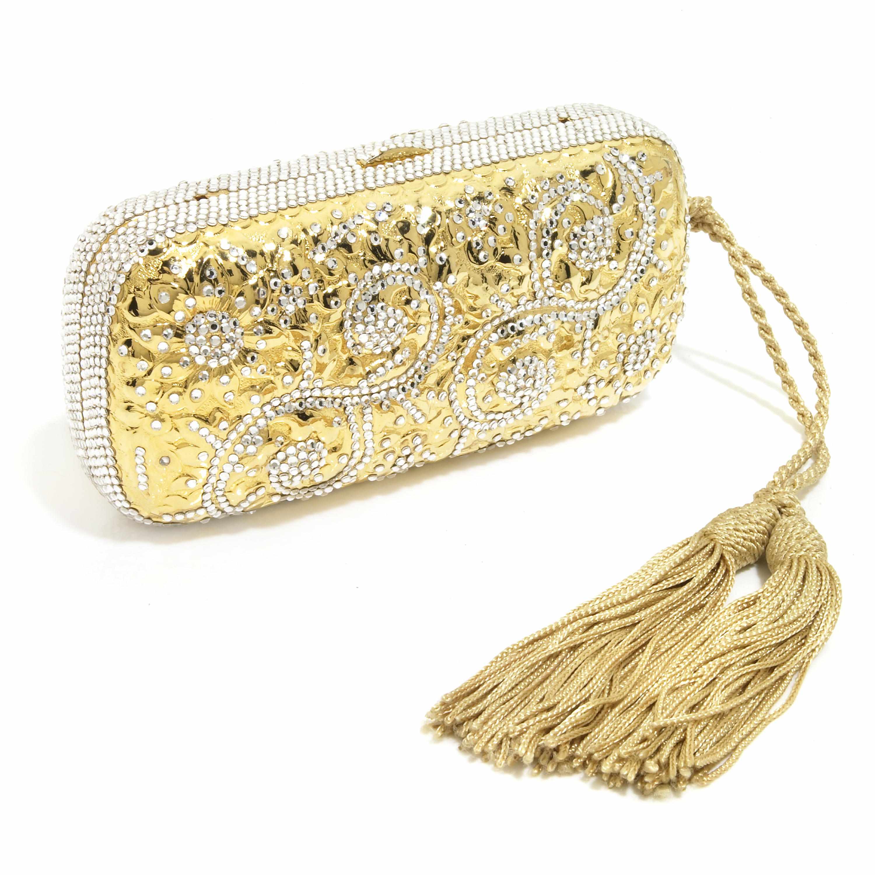 Appraisal: An embossed gold colored metal and silver crystal purse interior