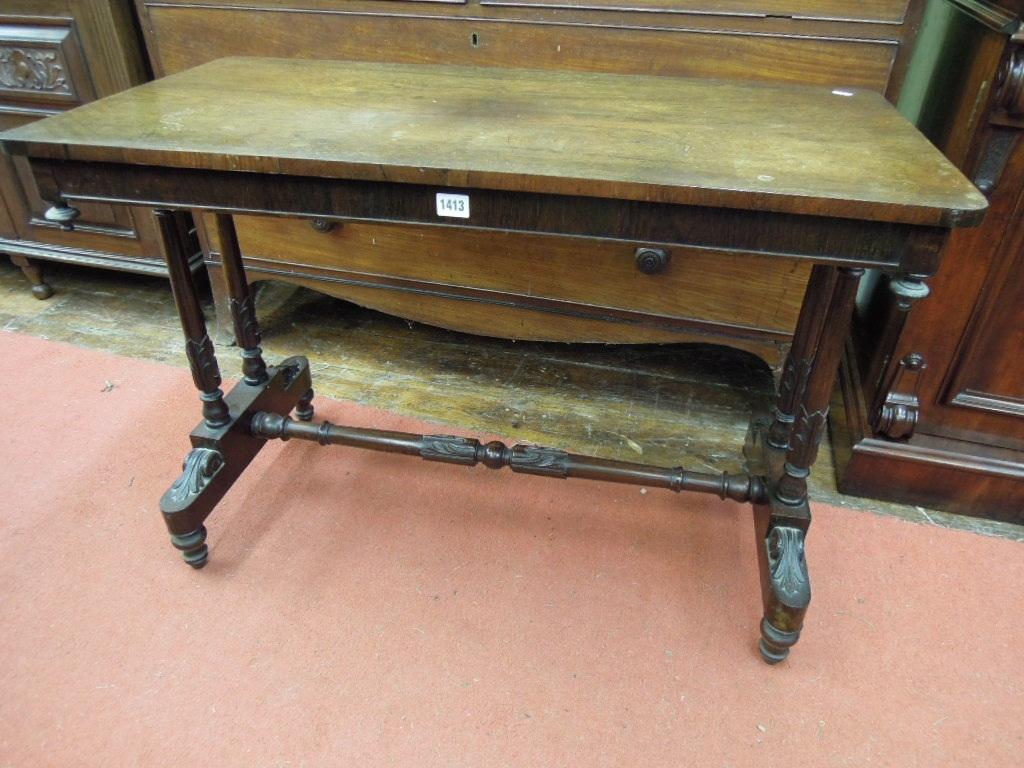 Appraisal: A Victorian rosewood centre table the rectangular top with rounded