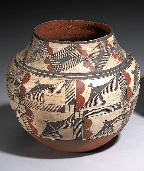 Appraisal: An Acoma polychrome jar Painted with a grid of hatchured