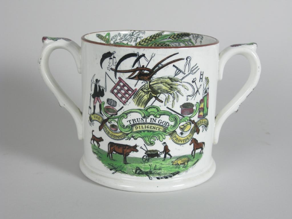 Appraisal: A th Century pottery Mug with verse and over painted