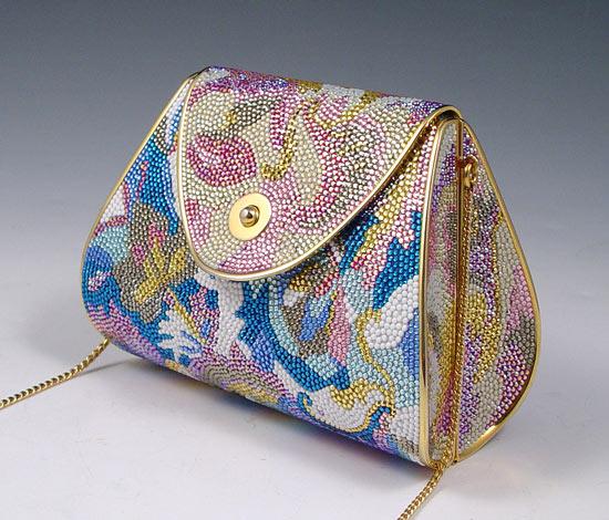 Appraisal: JUDITH LEIBER PASTEL CRYSTAL PURSE Austrian crystal on gold tone