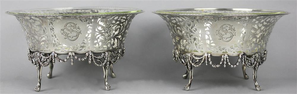 Appraisal: PAIR OF EDWARD VII SILVER CIRCULAR FOOTED BASKETS London maker's