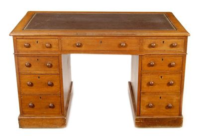 Appraisal: A Victorian walnut twin pedestal desk the moulded edge top