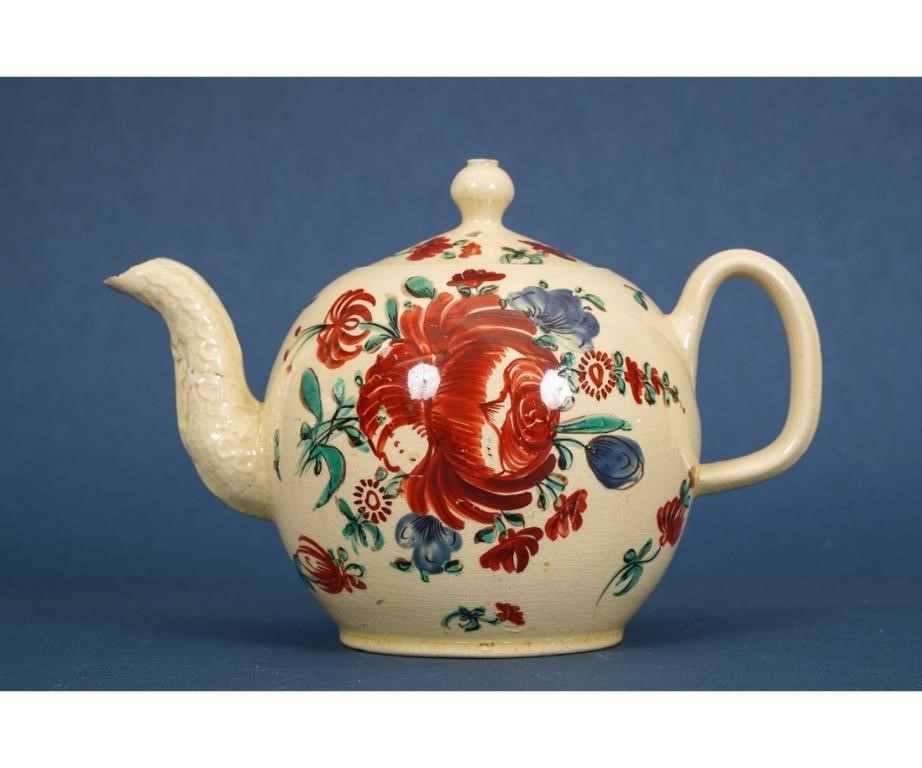 Appraisal: English creamware teapot circa with red thistle decoration h x