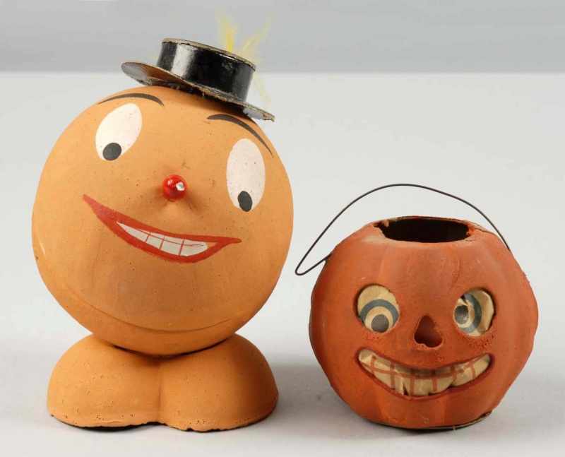 Appraisal: Lot of Halloween Pumpkin Face Candy Containers Description Western Germany