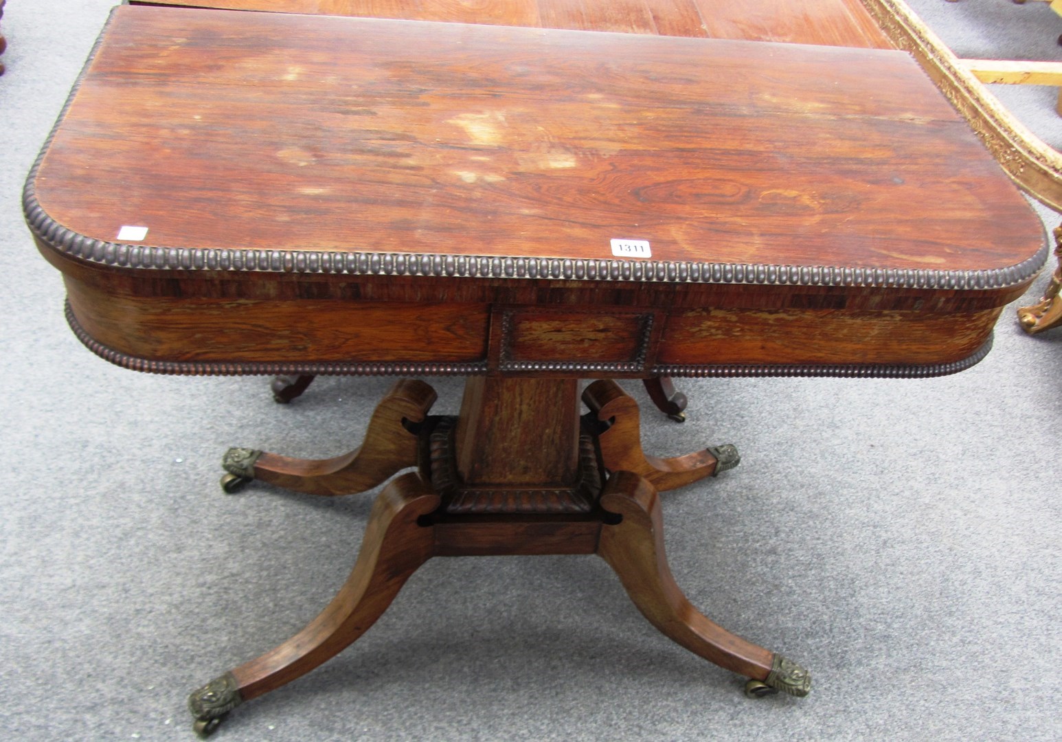 Appraisal: A George IV rosewood card table on tapering canted square