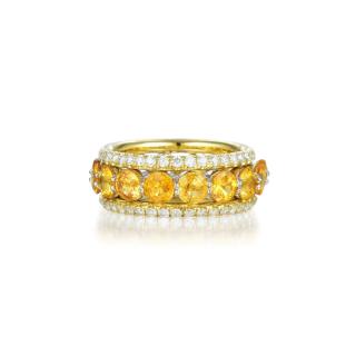 Appraisal: A Yellow Sapphire and Diamond Eternity Ring Featuring a center