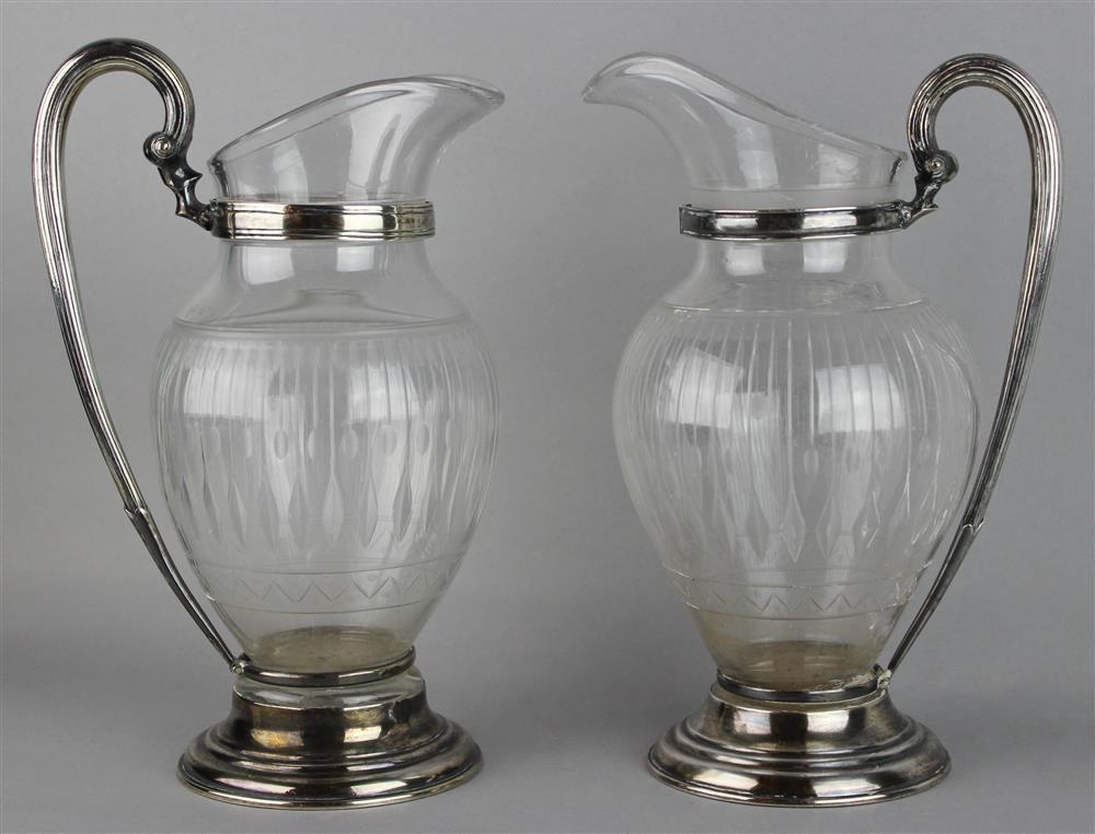 Appraisal: PAIR OF FRENCH SILVER MOUNTED GLASS EWERS late th C