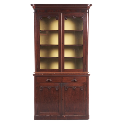 Appraisal: A Victorian mahogany bookcase the upper part fitted with adjustable