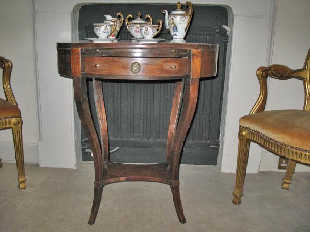 Appraisal: AN EMPIRE STYLE MAHOGANY OCCASIONAL TABLE with an oval top