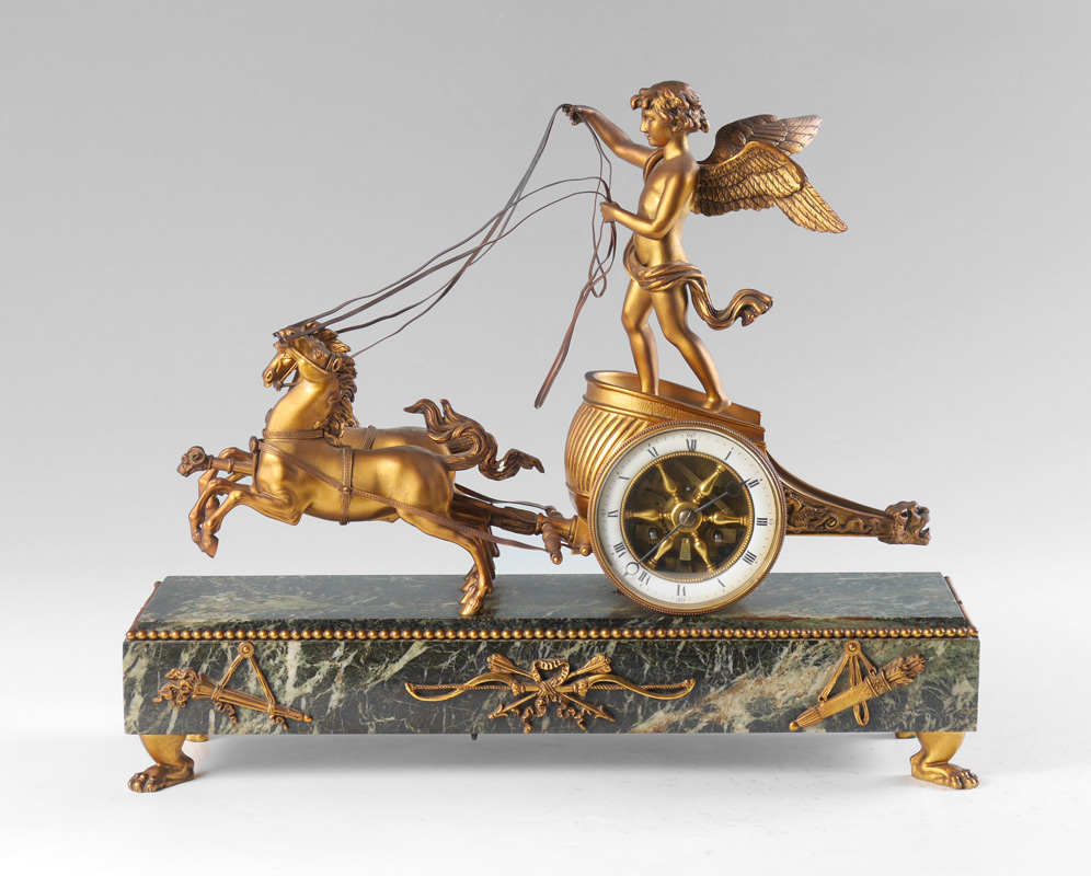 Appraisal: FRENCH FIGURAL WINGED CHERUB CHARIOT CLOCK Patinated bronze figure of