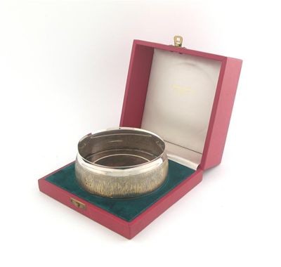 Appraisal: A modern parcel-gilt wine coaster with slightly convex textured side