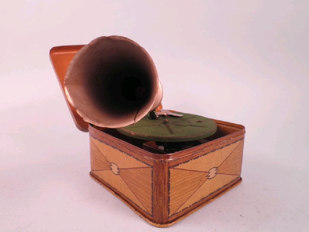 Appraisal: A Bing pigmyphone record player ina painted tin case stamped