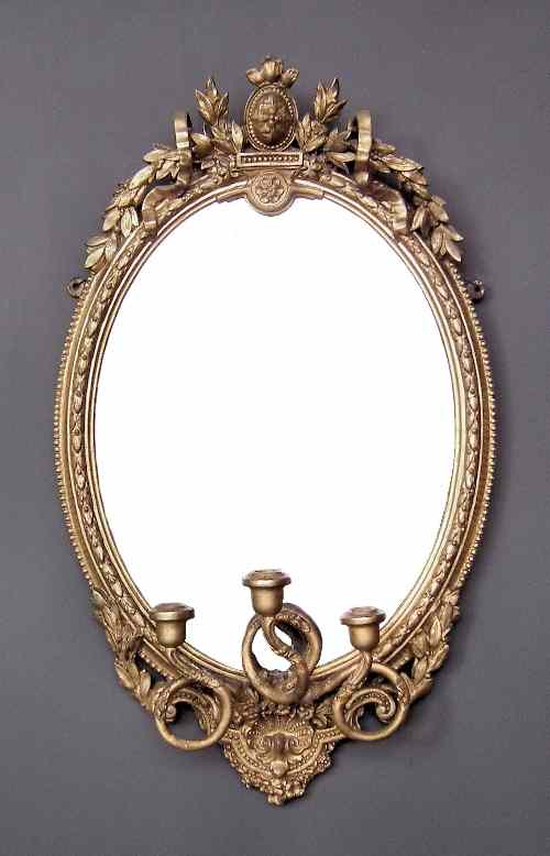 Appraisal: A th Century French gilt framed oval girandole with ribbon