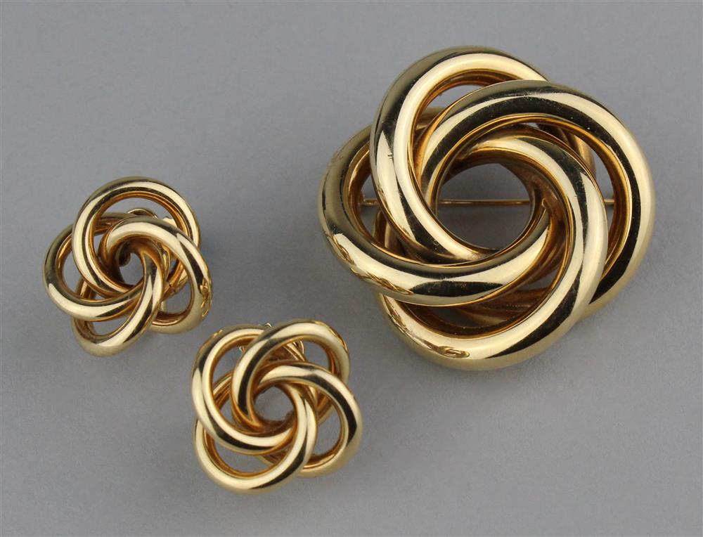 Appraisal: TIFFANY K YELLOW GOLD LOVE KNOT BROOCH AND MATCHING EARRINGS