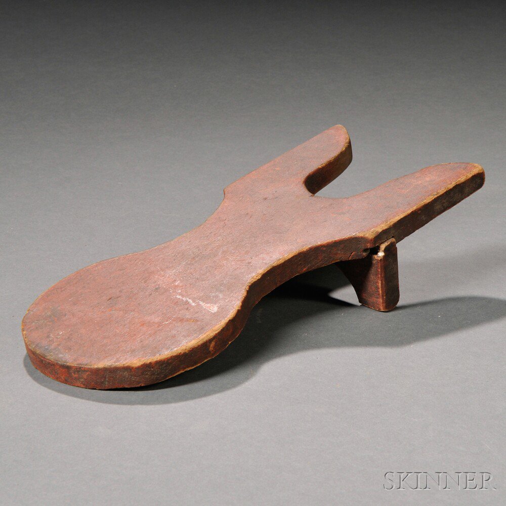 Appraisal: Red-painted Pine Bootjack America early th century with dovetailed support