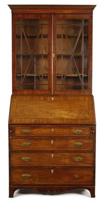 Appraisal: A late George III mahogany bureau bookcase inlaid stringing the