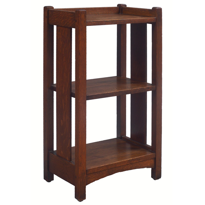 Appraisal: Limbert magazine stand three shelves over an arched toe-board with