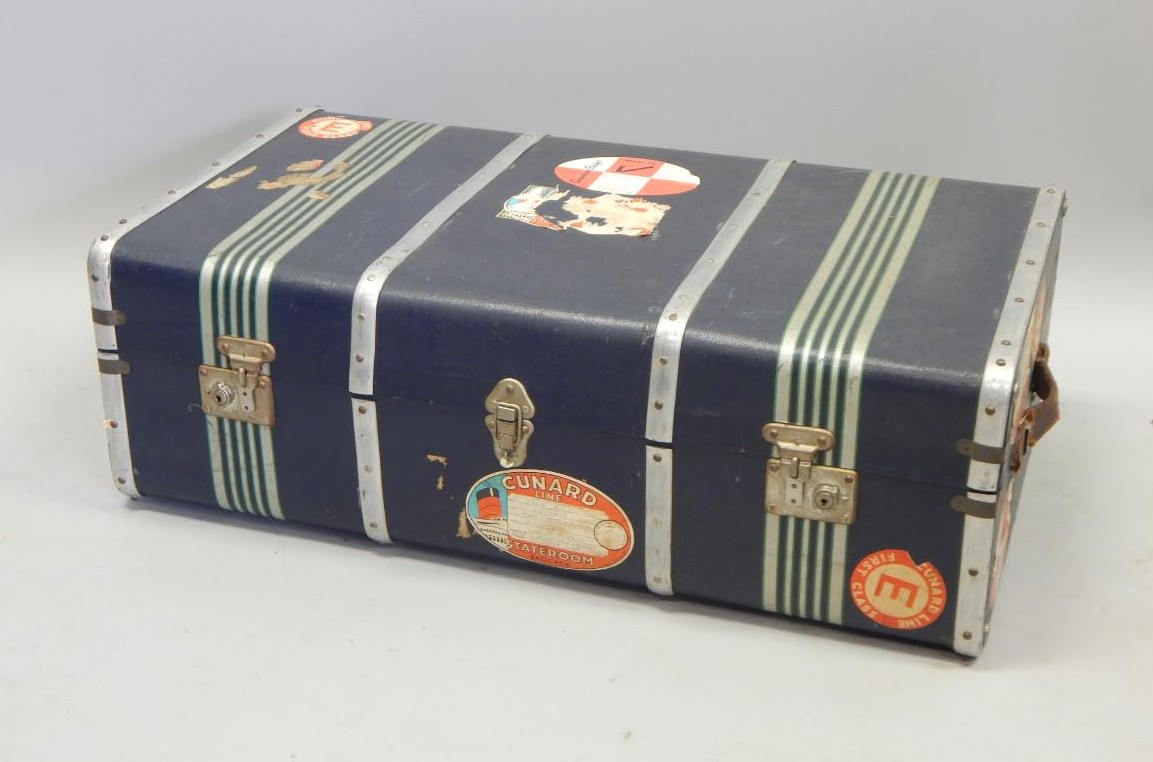 Appraisal: An unusual canvas and aluminium bound cabin type trunk bearing