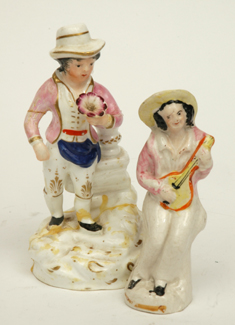 Appraisal: TWO VICTORIAN STAFFORDSHIRE CERAMIC FIGURES