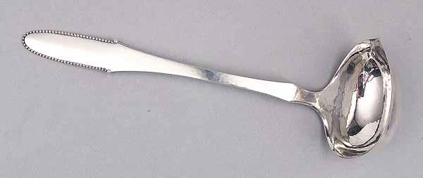 Appraisal: A Georg Jensen Silver Bead Pattern Punch Ladle Copenhagen pattern