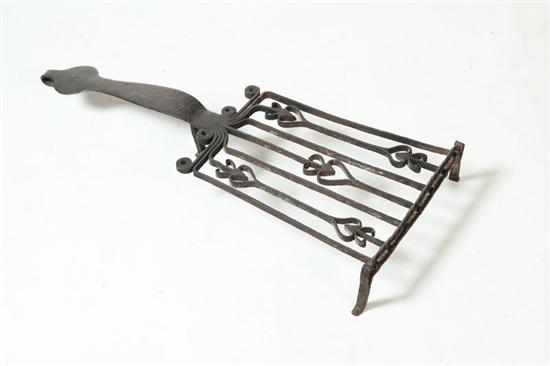 Appraisal: WROUGHT IRON TRIVET American th century Heart and rope twist