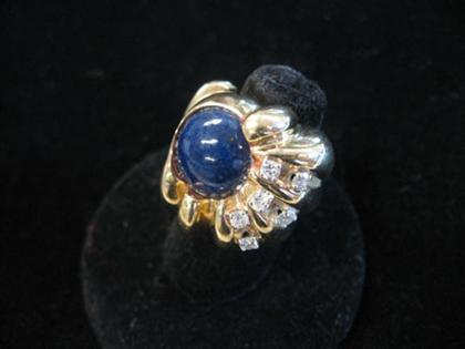 Appraisal: karat yellow gold lapis lazuli and diamond ring Cabochon lapis