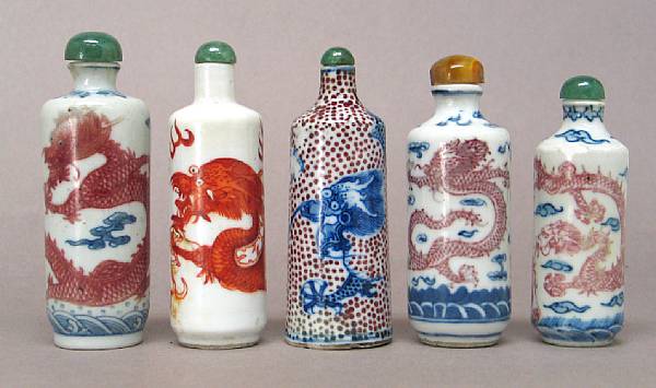 Appraisal: A group of five cylindrical porcelain snuff bottles with dragon