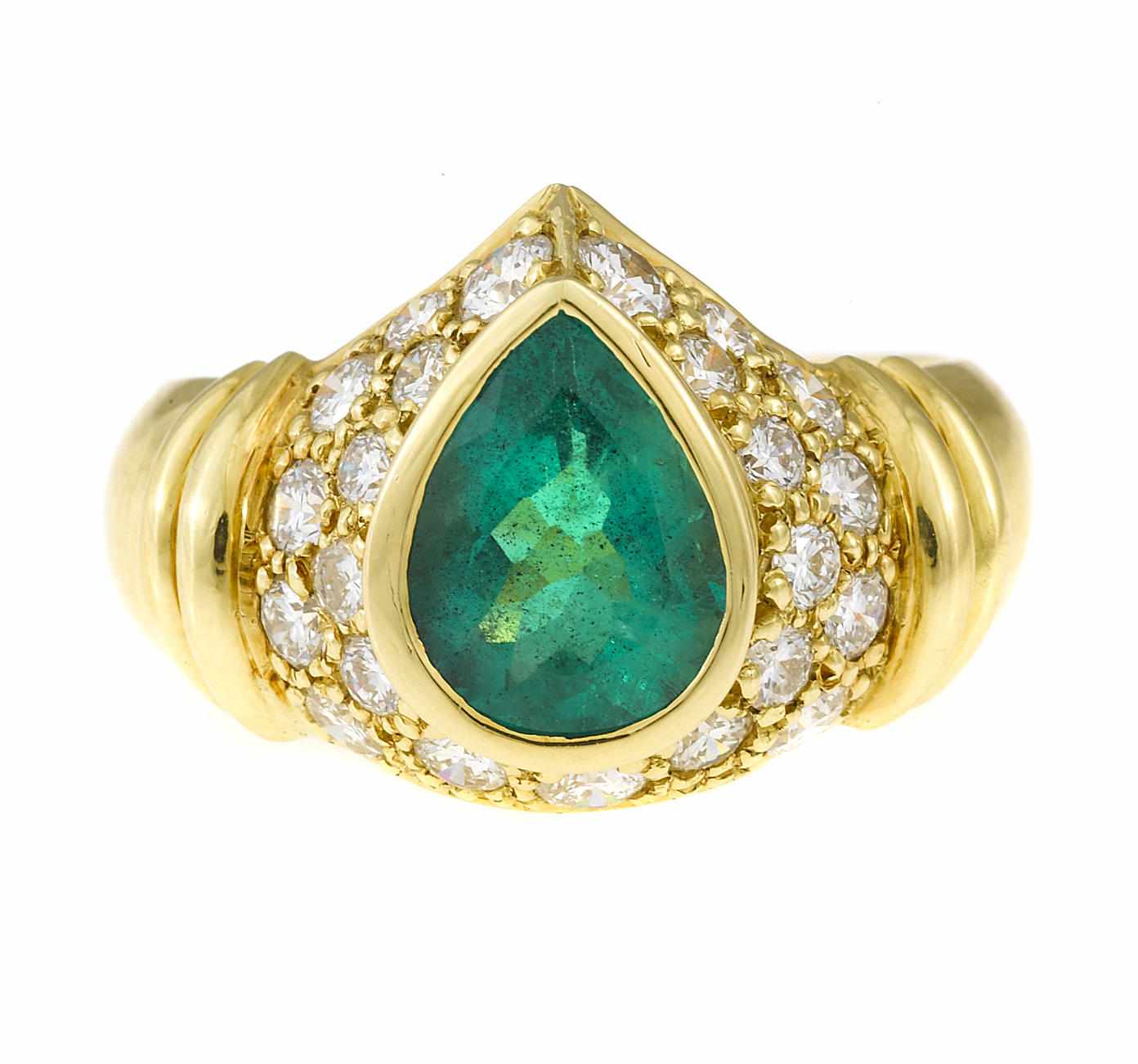 Appraisal: An emerald and diamond ring pear-shaped emerald weighing approximately carats