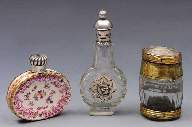 Appraisal: A SILVER MOUNTED OVAL PORCELAIN SCENTBOTTLE with foliate decoration cm