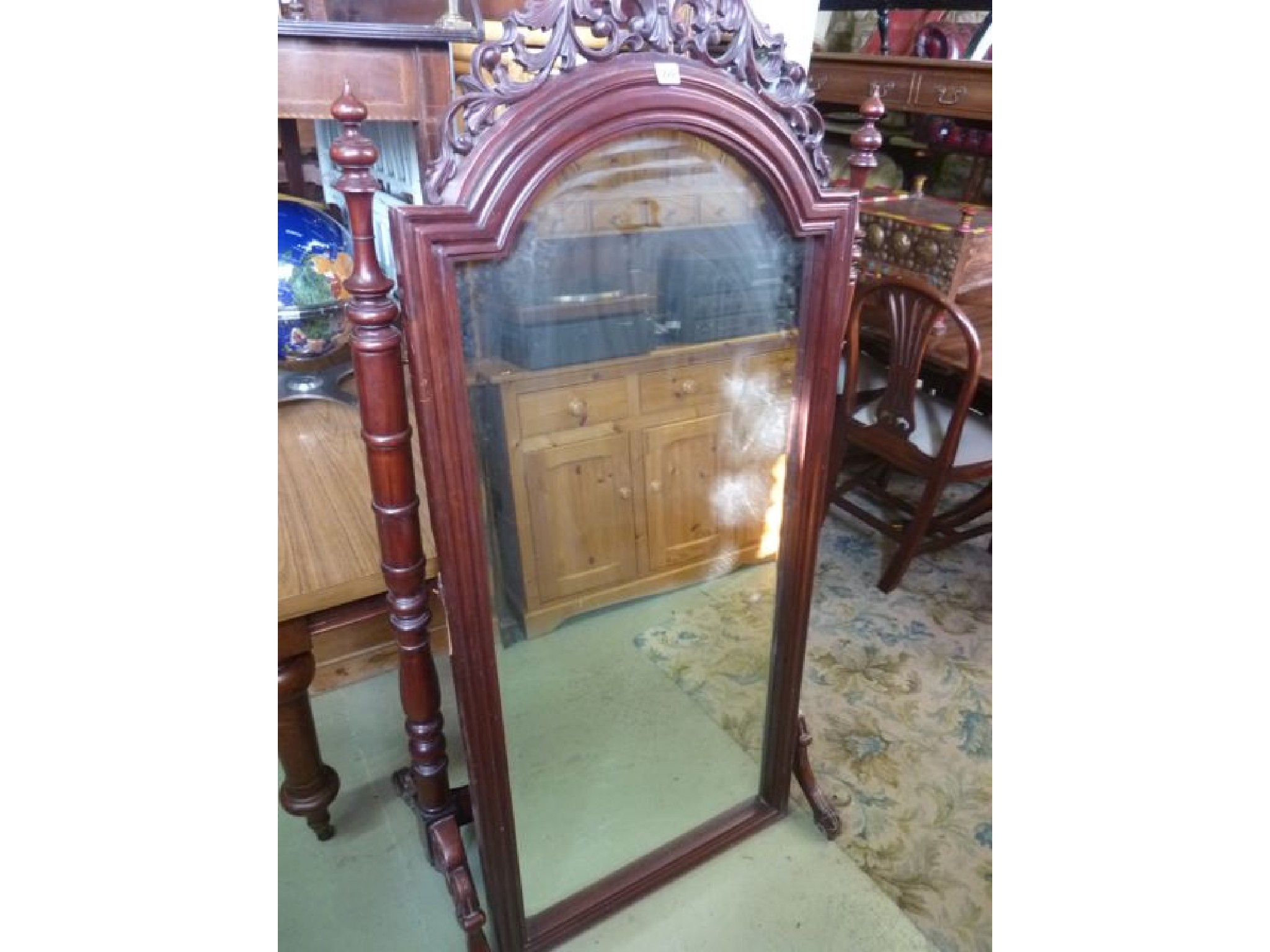 Appraisal: A reproduction hardwood cheval mirror of stepped arched form with