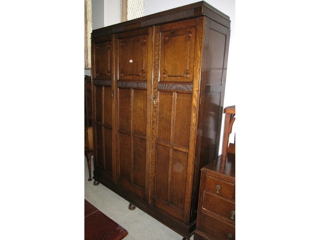 Appraisal: Oak Jacobean style triple wardrobe and dressing table