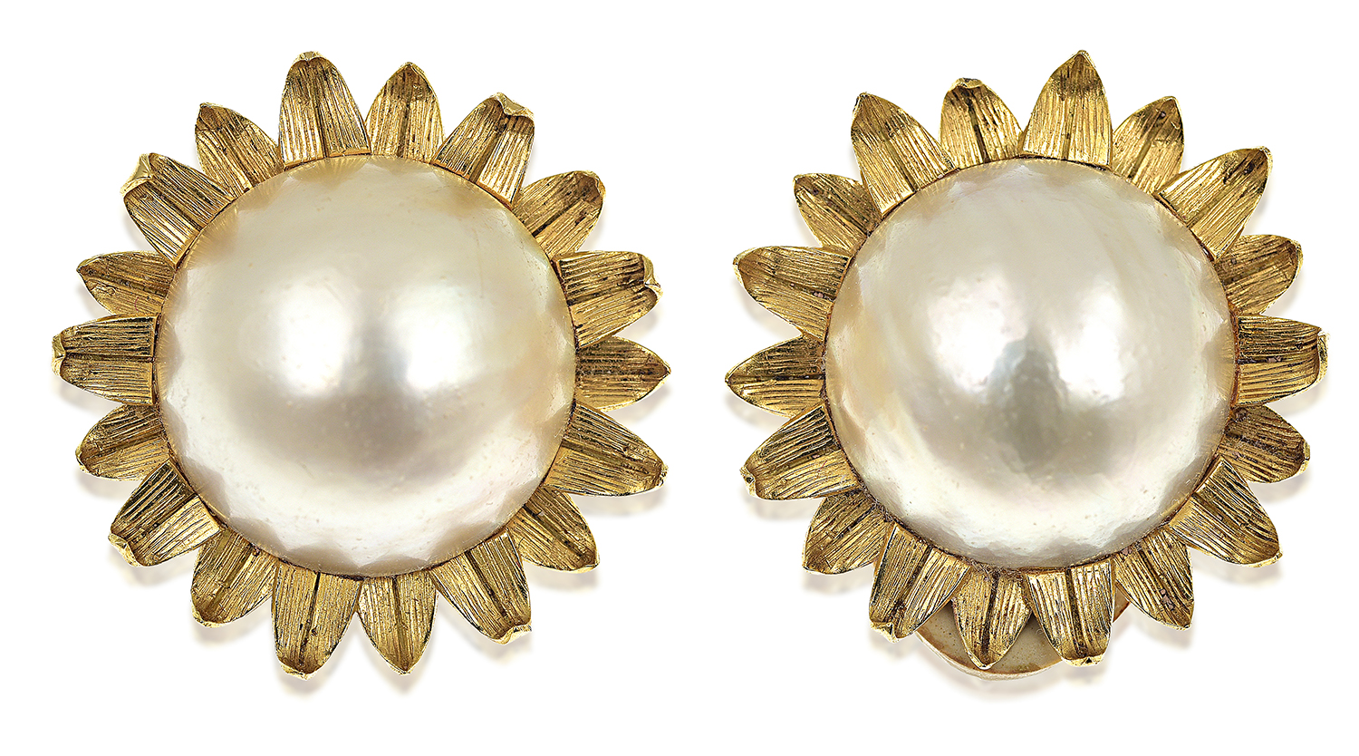 Appraisal: A PAIR OF MABE PEARL EARRINGS Each set with a