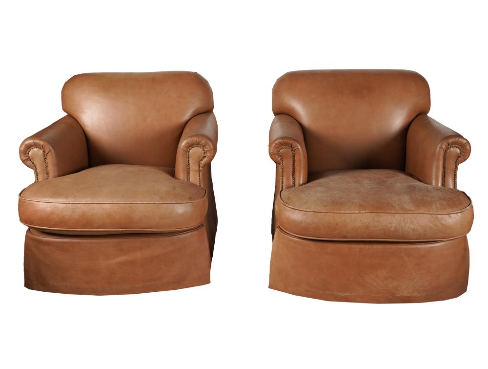 Appraisal: PAIR OF BROWN LEATHER CLUB CHAIRSunsigned on swivel bases inches