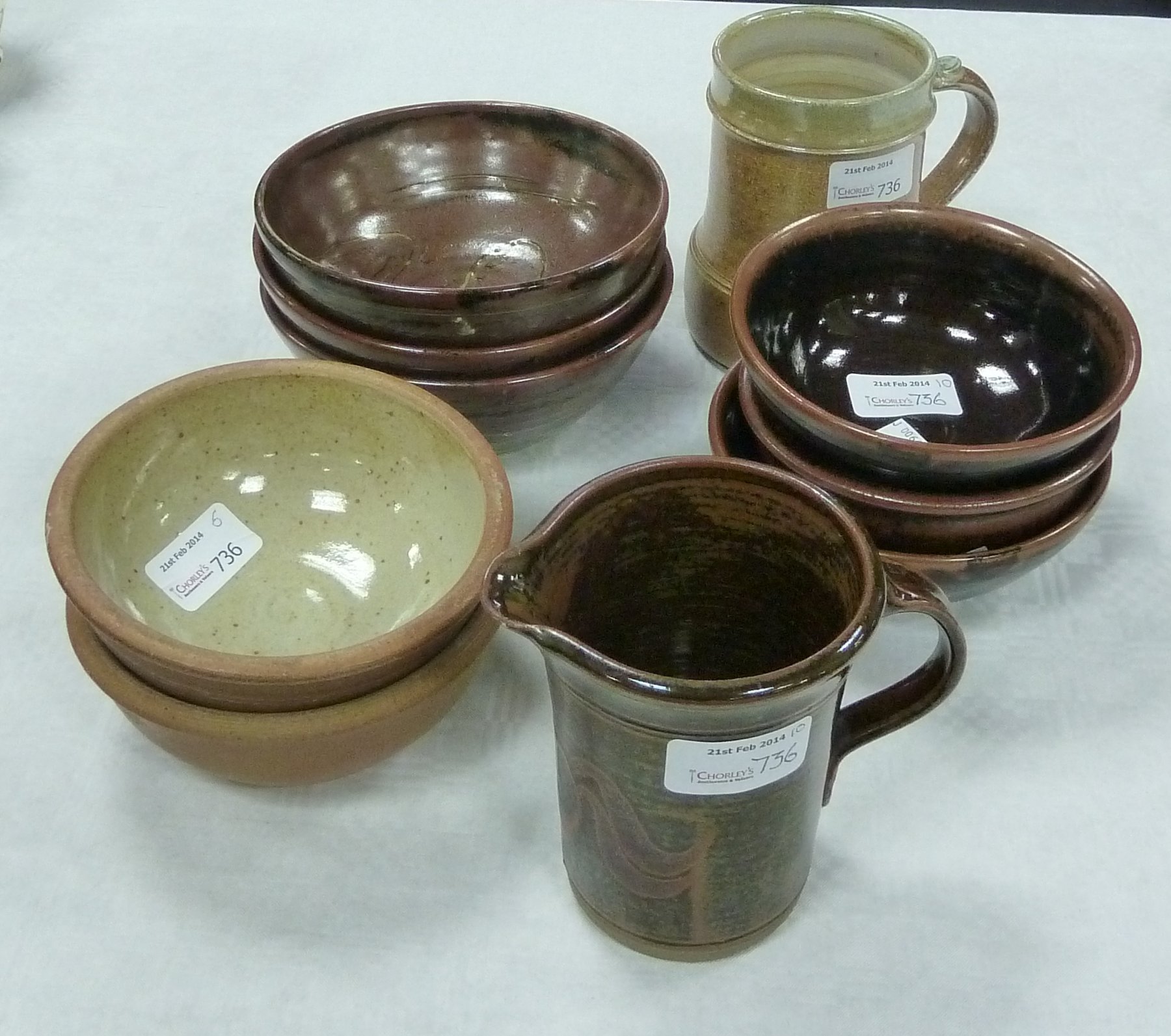 Appraisal: Winchcombe Pottery Three small bowls with combed decoration cm diameter