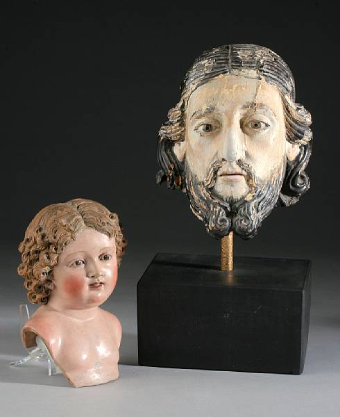 Appraisal: An Italian polychrome head of a saint th century With