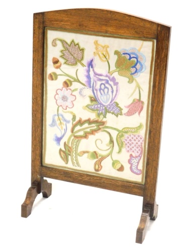 Appraisal: An early thC oak framed fire screen with embroidered floral