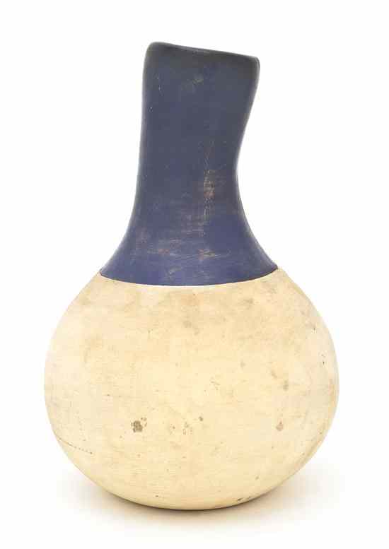 Appraisal: A Weller Pottery Vase of bottle form with two-tone glaze